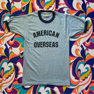 Vintage 70s single stitch light heather blue “American Overseas” ringer tee